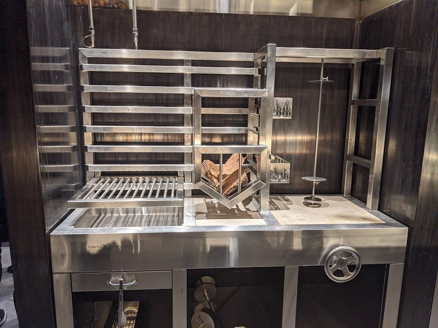 Custom stainless wood-fired grill firepit